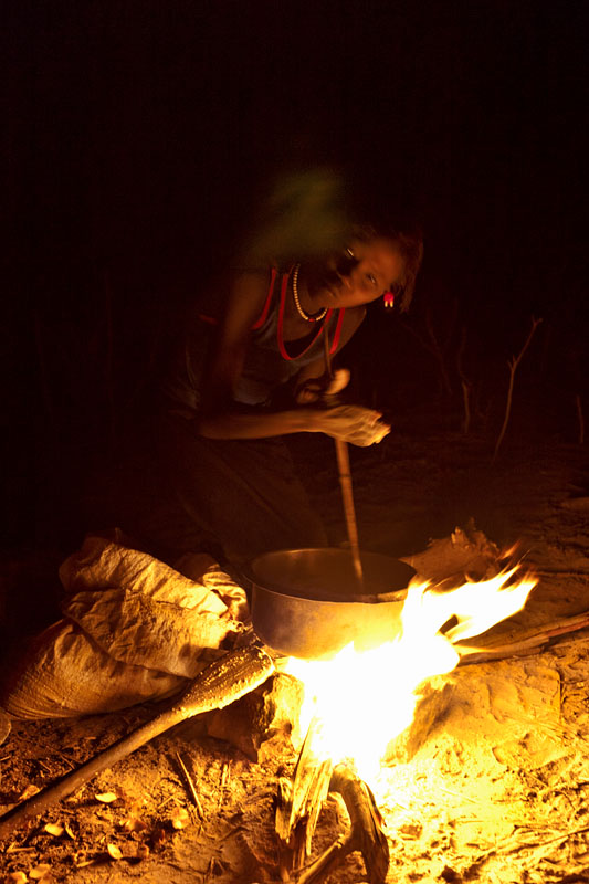  Pokot girl preparing the porridge for her family   Kenya